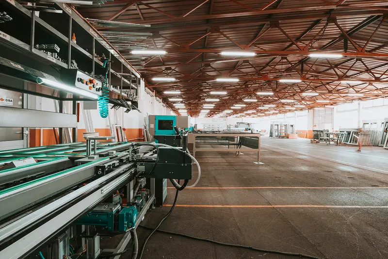 A long production line in a bright factory hall