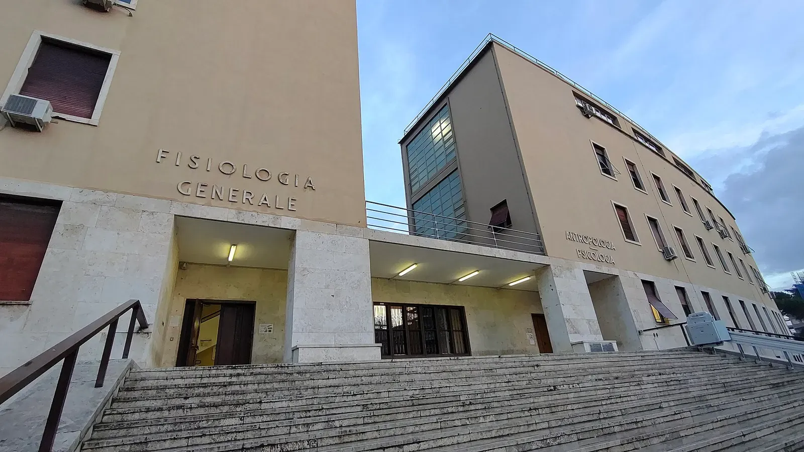Steps leading to the entrance of a Sapienza University building in Rome, marked Fisiologia Generale